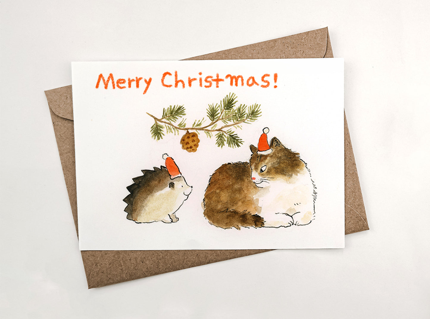 Christmas greeting card - A cat and a hedgehog